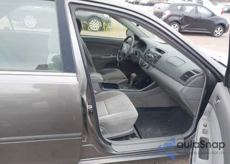 2002 Toyota Camry Le from USA, damaged, VIN 4T1BE32K52U529087